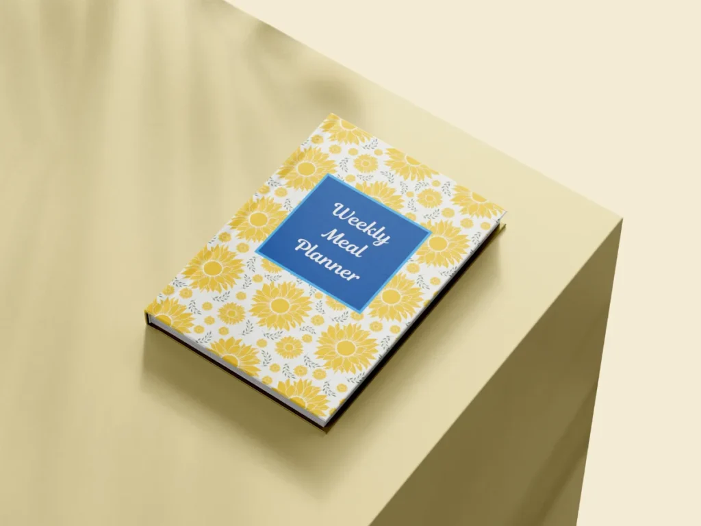 Pembaca menulis refleksi setelah membaca buku di dekat agenda mingguan